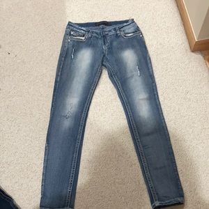 Never worn light blue bootcut jeans.